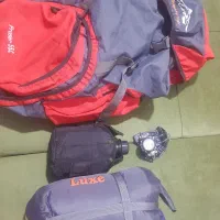 کوله پشتی کوهنوردی به همراه لوازم جانبی
