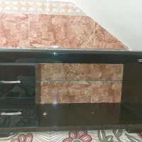 میز تلویزیون شیشه ای و چوبی
