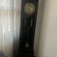 ساعت ایستاده و پرده