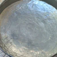 تزقن