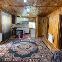 کلبه چوبی دوخواب شیک وجنگلی (نزدیک رودخونه)