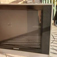 یک عدد تلویز یون و میز