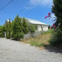 زمین ۲۳۰ متری قابل ساخت شهرک نزدیک جاده