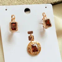نیمست پلاک و گوشواره ژوپینگ مدل نگین قرمز