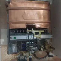 تعمیرات آبگرمکن نصب پکیج رادیاتور نصب درب برقی
