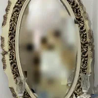 آیینه و یک جفت شمعدان