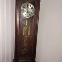 یک عدد ساعت ایستاده تمام چوب