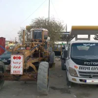 گریدر کوماتسو و تانکر آبرسانی