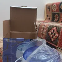 دستگاه شمع و موم  صورت و بدن.و تعدادی رنگ مو