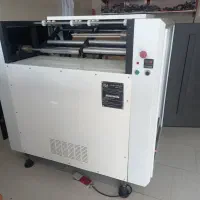 دستگاه رول کن سفره یکبارمصرف دولاین صنعتی