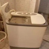 ماشین لباسشویی سطلی.