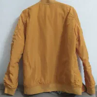 کاپشن|لباس|کرمانشاه, |دیوار