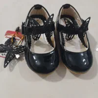 کفش مجلسی و کریر کودک و کیسه خواب