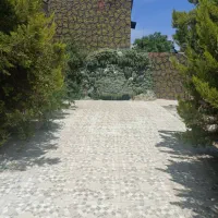 فروش-زمین200متری-درب-از-حیاط-دارای-مجوز-سند-تک-برگ