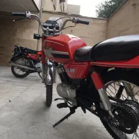 موتور ax100دوزمانه سوزوکی