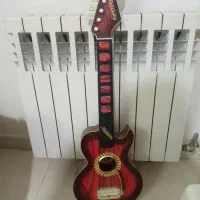 گیتار بزرگ اسباب باز