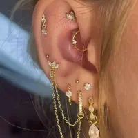 پیرسینگ گوش لب ابرو بینی ناف میکرودرمال کاشت نگین