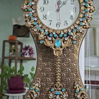 ساعت دیواری آونگ دار