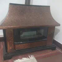 بخاری شومینه توان گاز