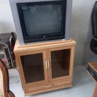 تلوزیون اصل ال جی LG کاملا سالم و کمد میز