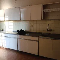 نظم دهنده ظروف و کابینت و سینک و سنگ و شیر آب