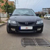 مزدا ۳۲۳ مشکی