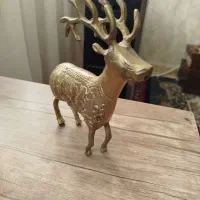 مجسمه برنجی|کلکسیون اشیاء عتیقه|تهران, خواجه نظام الملک|دیوار