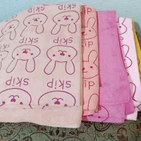 حوله و کلاه حمام