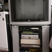 تلویزیون  ۲۹ اینچ LG   به همراه میزش