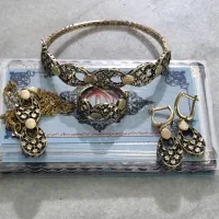 مقداری طلا و سکه پارسیانی فروشی