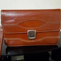 کیف چرم طبیعی پاسپورتی رمزدار مردانه در حد نو