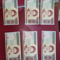 اسکناس ۱۰۰ تومانی و ۱۰تومانی