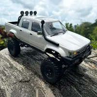 ماشین کنترلی آفرود هایلوکس RC حرفه‌ای با کمک فنر