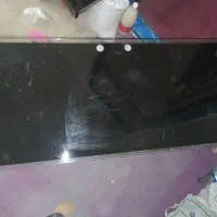 میز تلویزیون شیشه ای دو کشور دار