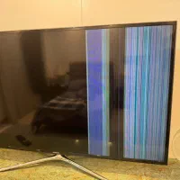 تلوزیون پنل خط دار و اب خورده تعمیر می شود