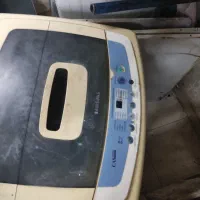 لباس شویی اتوماتیک .پتوشور درب از بالا