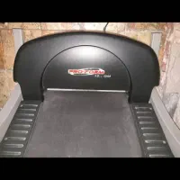 یک عدد دستگاه تردمیل