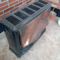 بخاری گازشهری بین مُبلی درحدّنو|بخاری، هیتر، شومینه|برازجان, |دیوار