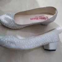 کفش نو|کیف، کفش، کمربند|قم, سنگ بند|دیوار