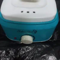 دستگاه موم گرم کن