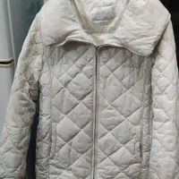 کاپشن سفید شیری