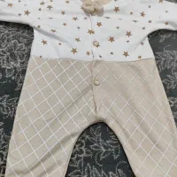 چند تکه لباس نوزادی