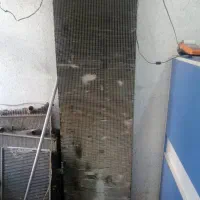 یک رادیاتور تراک،بیل،وسایلی که متراژمثل این باشه