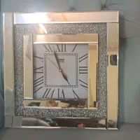 ساعت دیواری آیینه‌ای