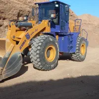 لودر و ماشین اماده به کار