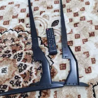 پایه تلویزیون و کنترل