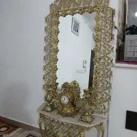 آینه و شمدان و ساعت