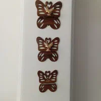 دیوار کوب و مجسمه