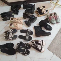 کیف چرم و کتونی و بوت و لباس