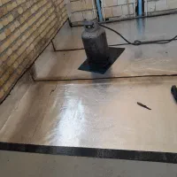 نصب اسفالت و ایزوگام پشت بام استخر و محوطه